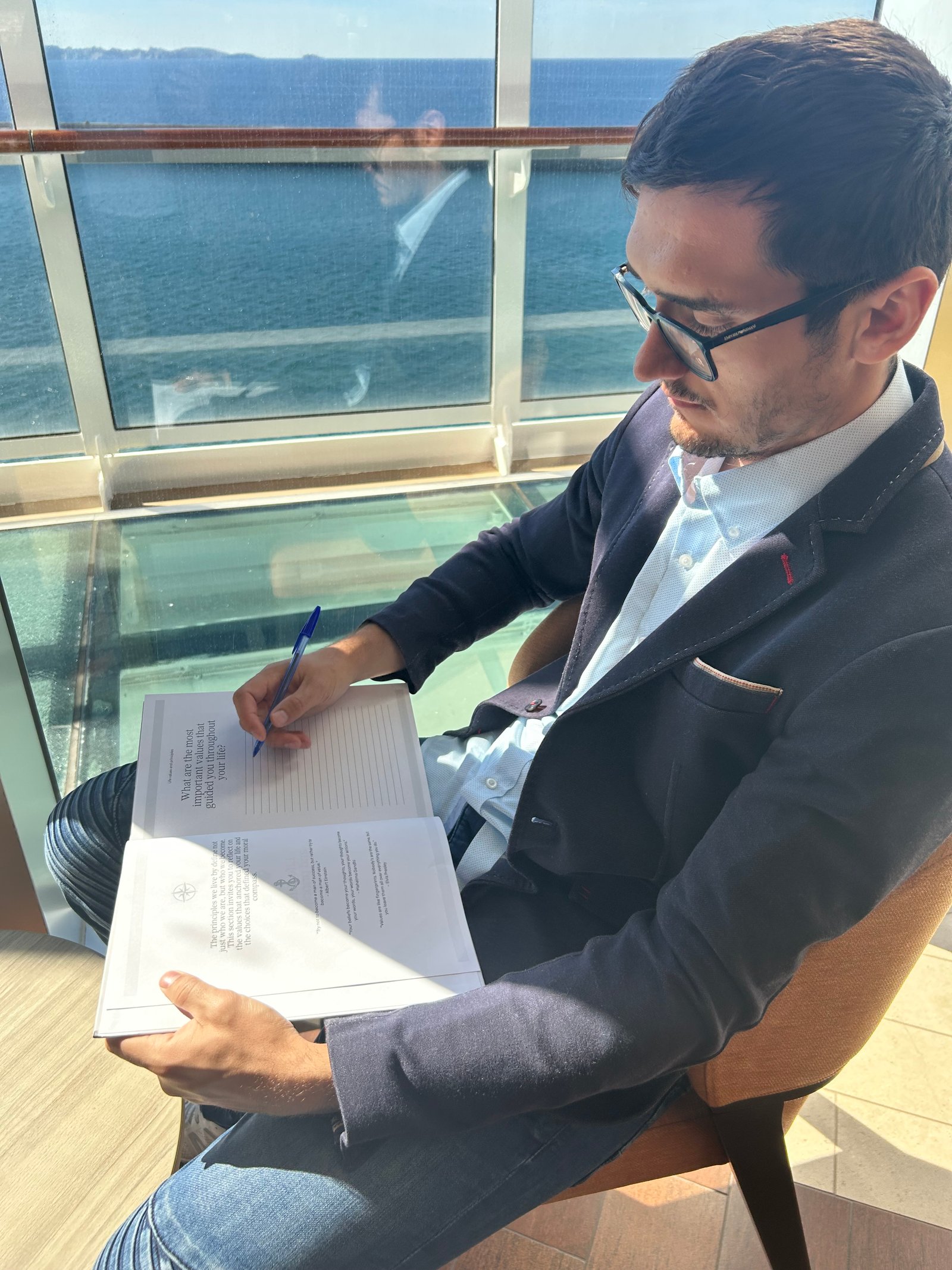 Man writing in notebook