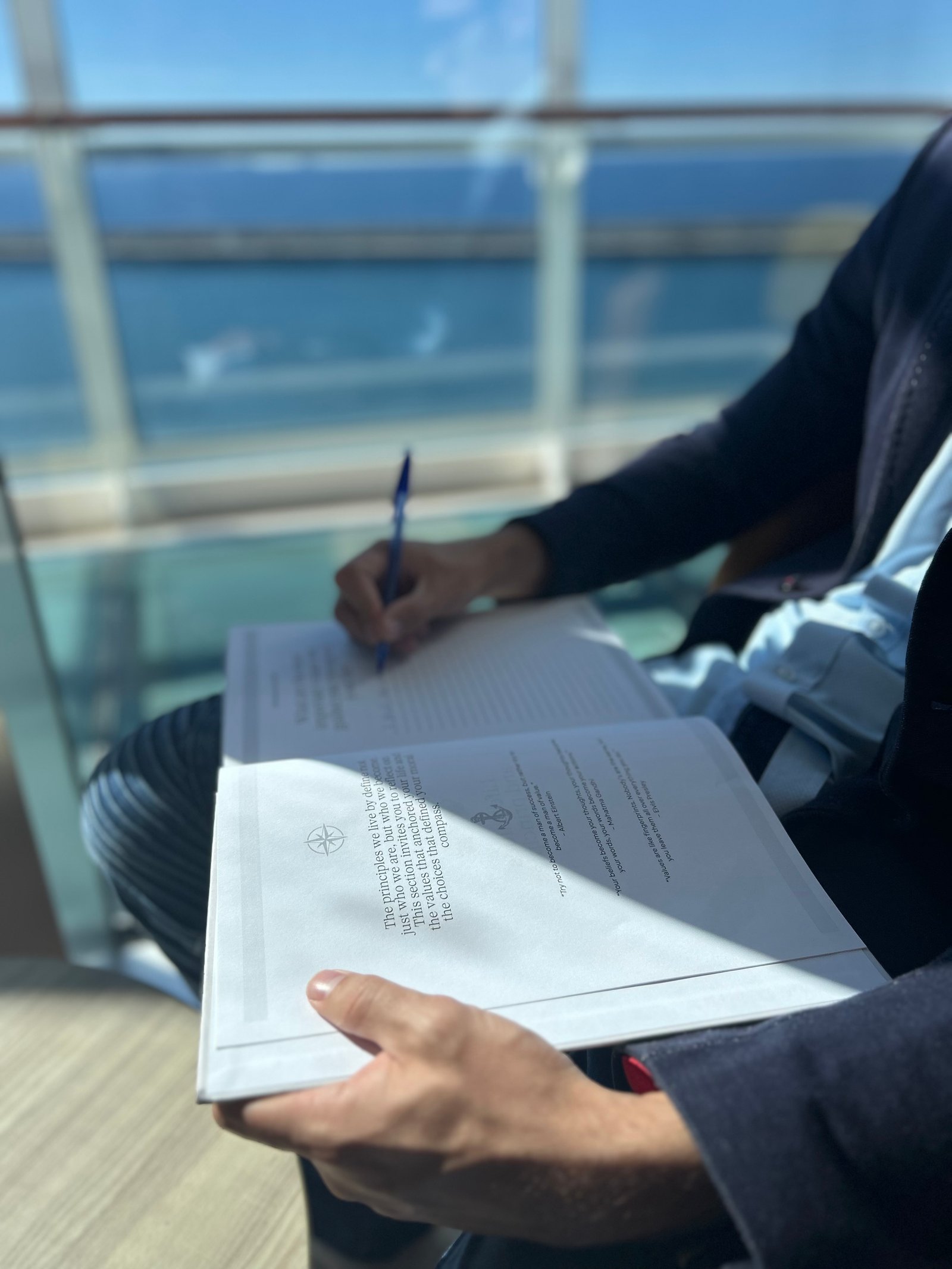 Close-up of writing in notebook