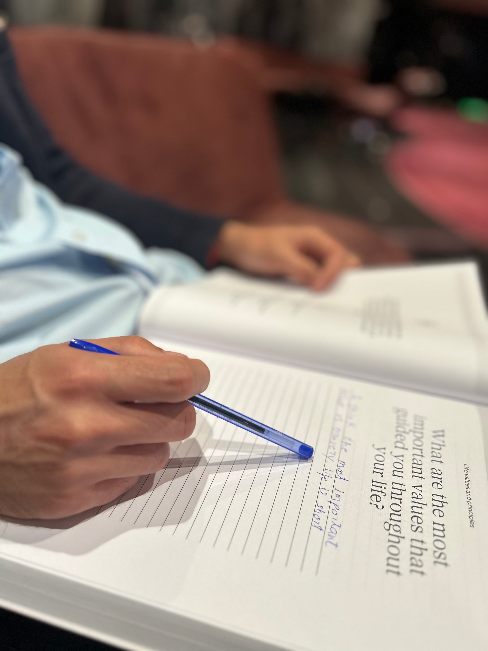 Hand writing answers in the notebook - Write